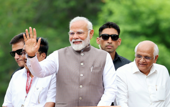 PM Modi Holds Grand Roadshow in Gandhinagar During Gujarat Visit